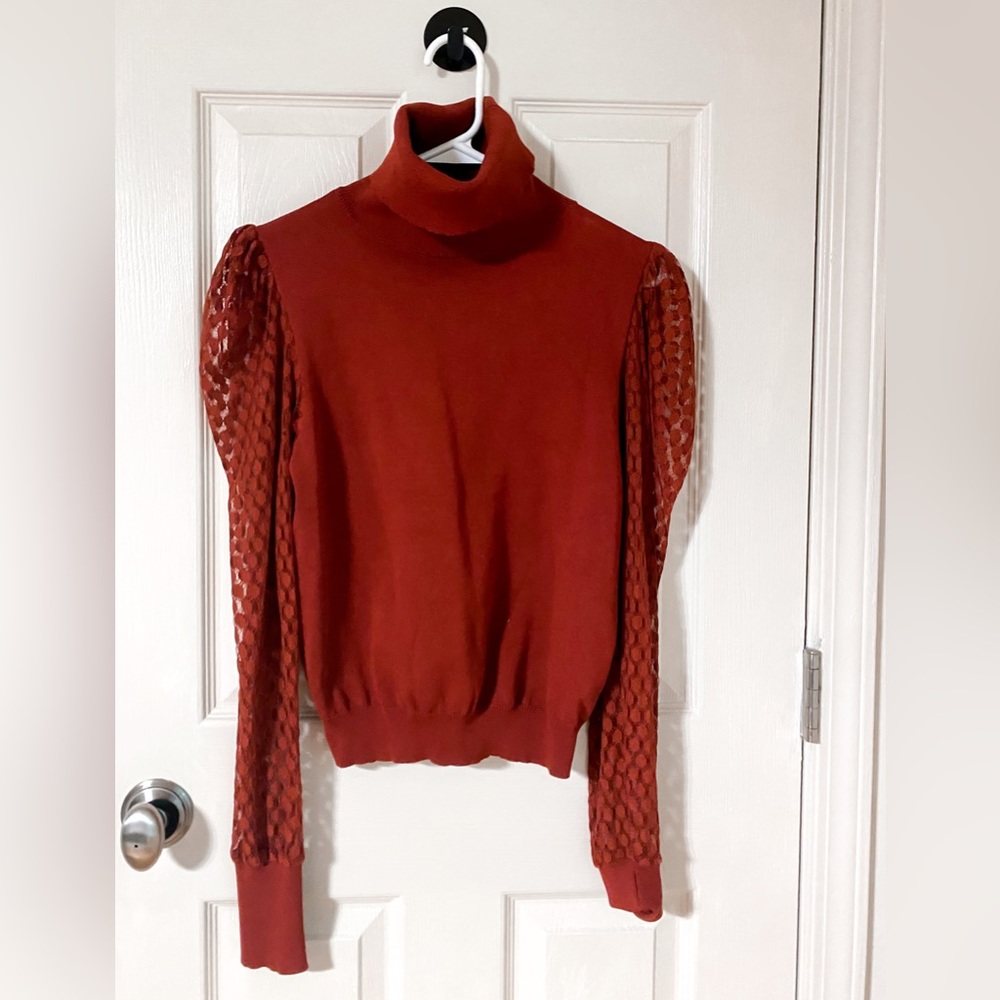 Never been worn burnt orange sweater